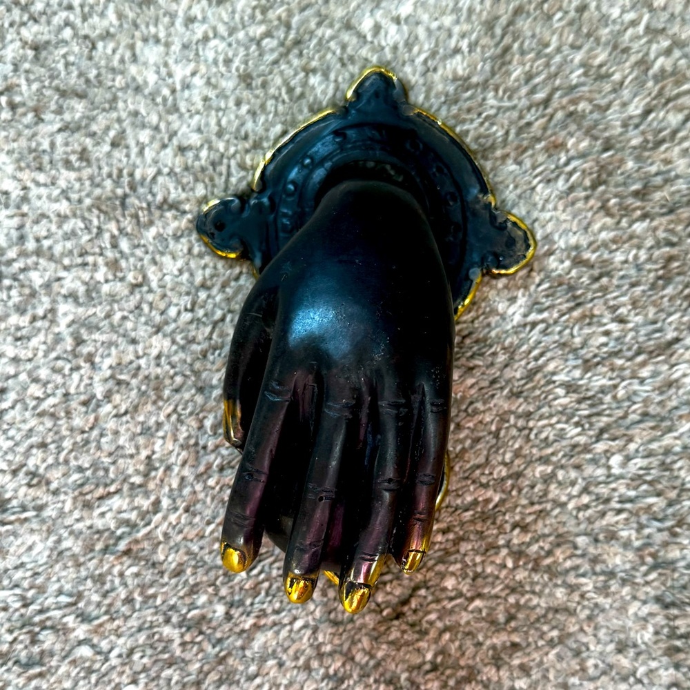 Brass and gold door knocker